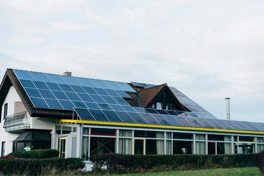 House with solar panels on the roof, representative image