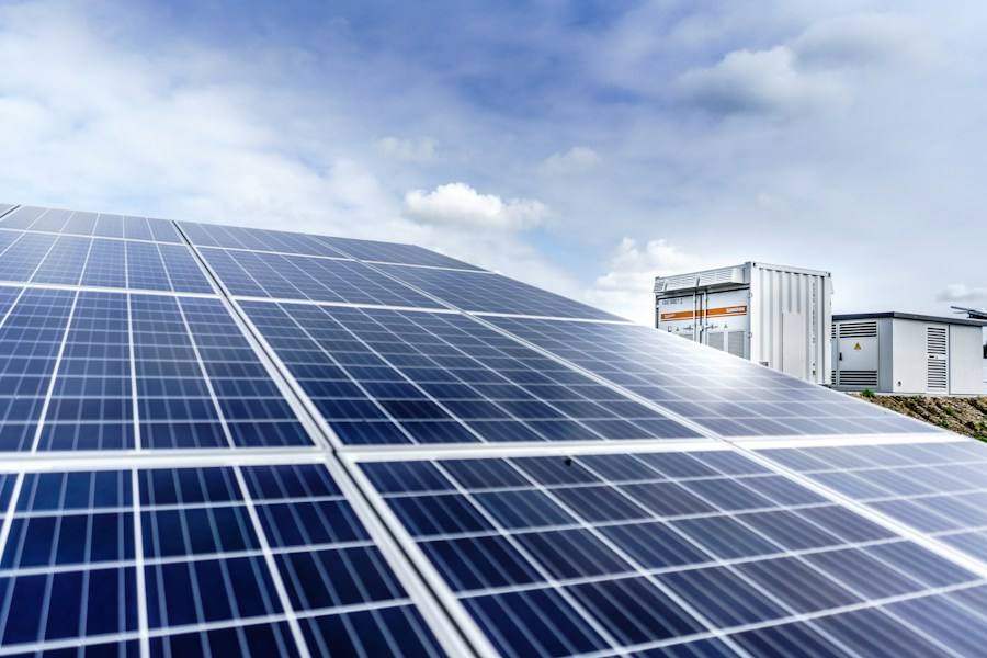Close-up of blue and white solar modules, representative image