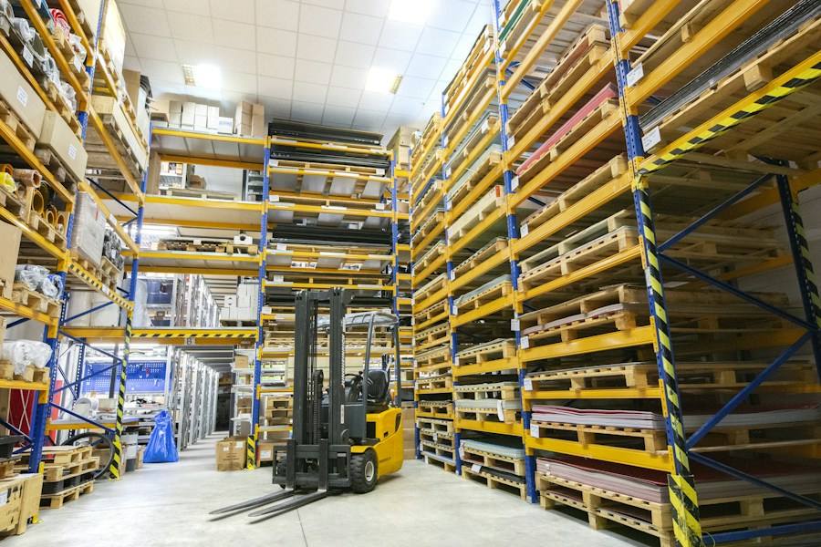 Warehouse filled with pallets, representative image