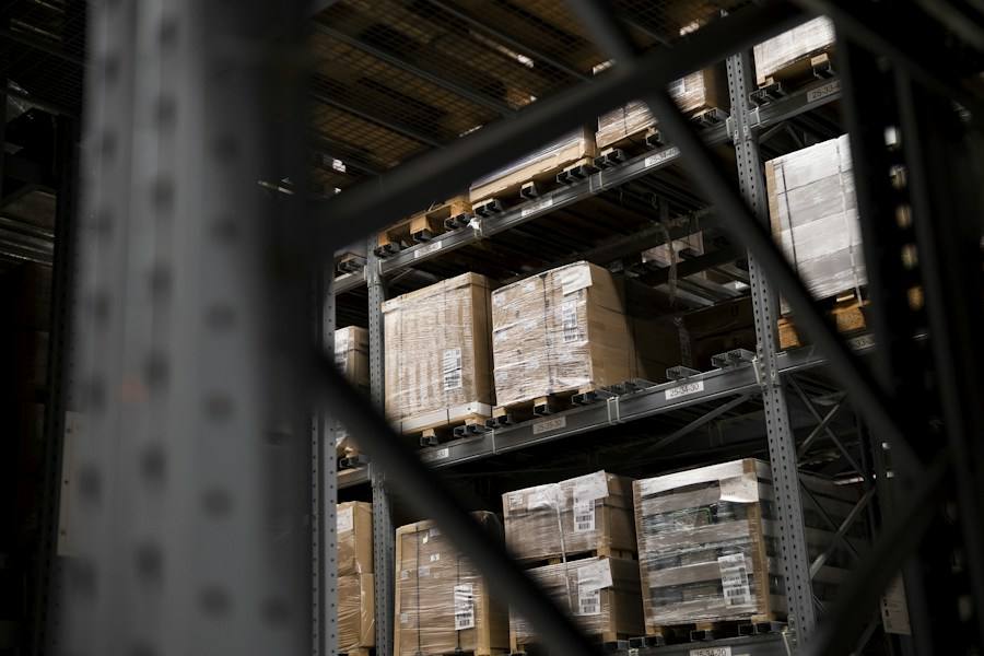 Warehouse aisles filled with pallets, representative image