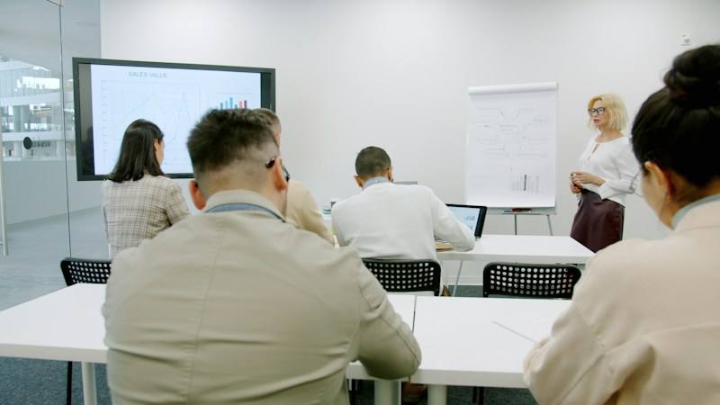 Team meeting in a conference room, representative image